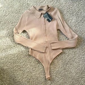 New with tags. Light brown collared bodysuit.